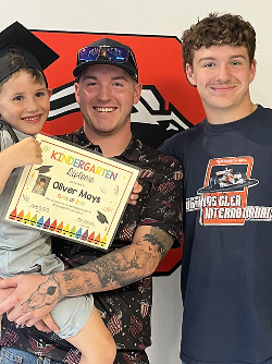 Carson with brothers